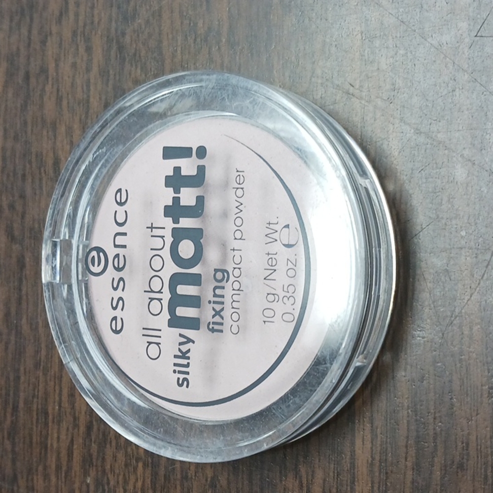 Fixing compact powder